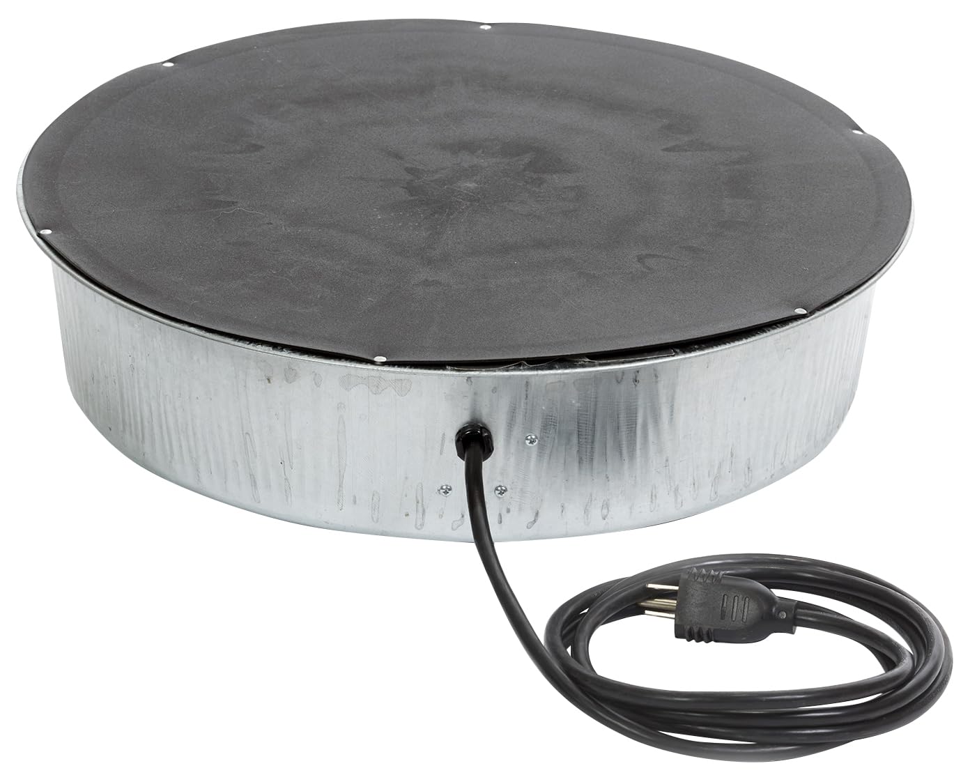 A backyard chicken waterer sitting on a heated base on a stable brick surface inside a covered chicken run in winter